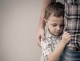 young boy hugging dad